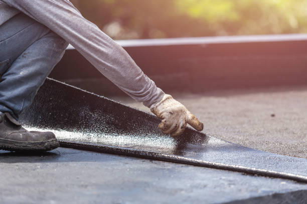 Professional Waterproofing technician working in Rossburg, OH